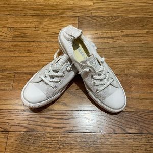 Cute light grey slip on Converse in a size 9. Never worn and are like new.